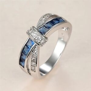 Blue Sapphire Criss Cross 10k White Gold Plated Bow Ring